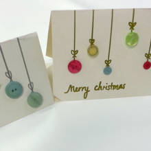 Jak ozdobić świąteczną kartkę za pomocą guzików?