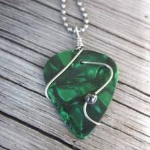 Jak wykonać zawieszkę z kostki do gitary?